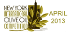 Logo for the New York International Olive Oil Competition featuring olive branches and a skyline. - Olive Oil Times