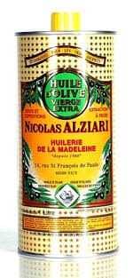 Green and yellow canister of Nicolas Alziari olive oil with a vintage design and text in French. - Olive Oil Times