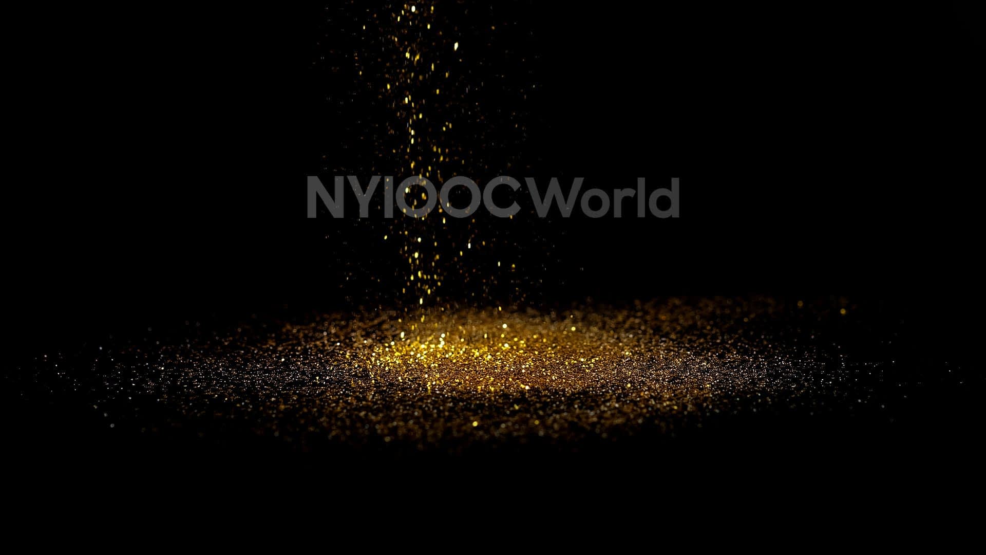 Partículas de brillo dorado que caen desde arriba sobre una superficie oscura, creando un efecto brillante. Olive Oil Times