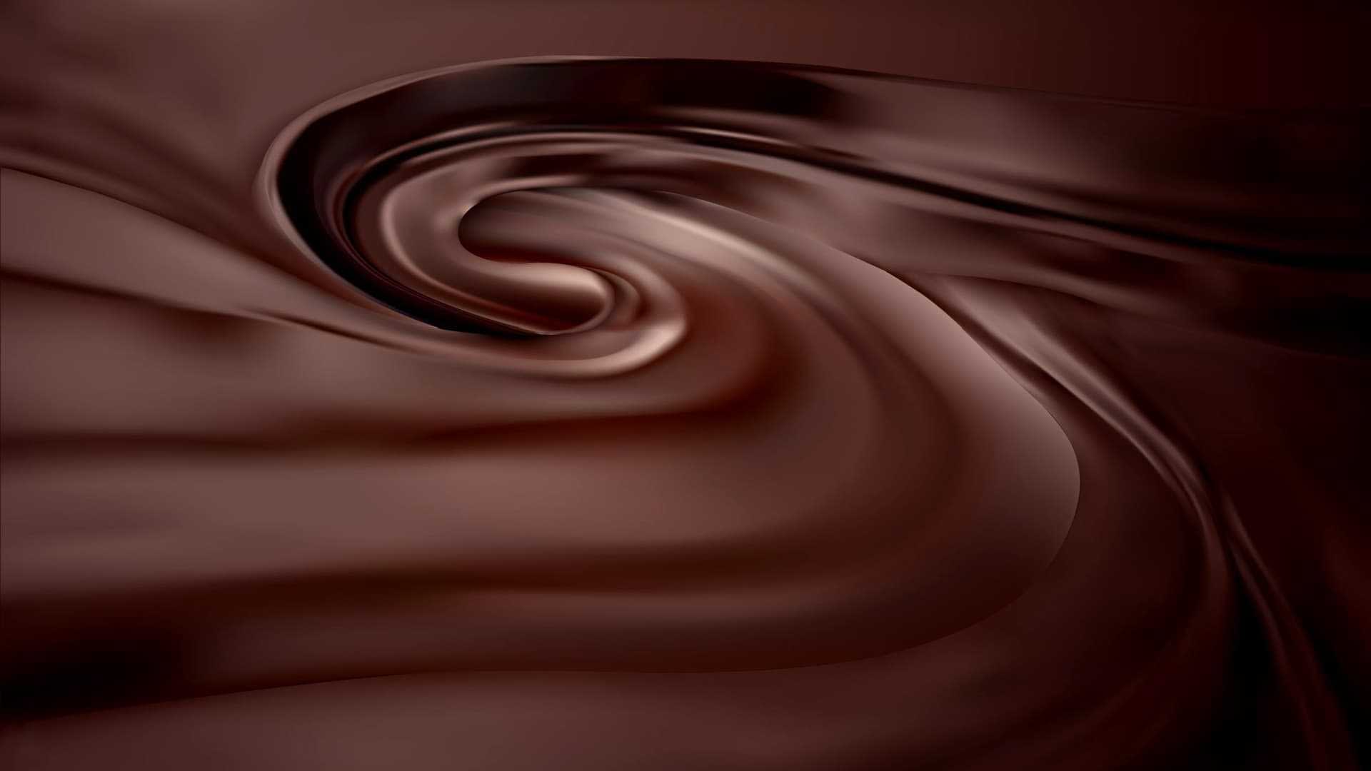 Smooth, swirling texture of dark chocolate with a glossy finish. - Olive Oil Times