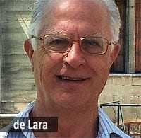 Retrato en primer plano de un hombre llamado de Lara con gafas y cabello gris. - Olive Oil Times
