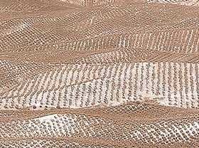 Aerial view of olive tree fields arranged in rows in Jaén, Spain. - Olive Oil Times