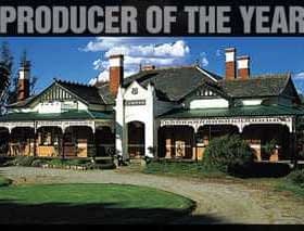 Historic Boundary Bend estate building with a large porch and multiple chimneys. - Olive Oil Times