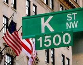 Letrero de calle verde para K Street NW con el número 1500 en Washington DC - Olive Oil Times