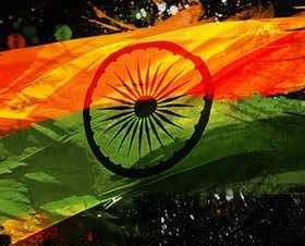Artistic depiction of the Indian flag with orange, white, and green colors and a navy blue Ashoka Chakra. - Olive Oil Times
