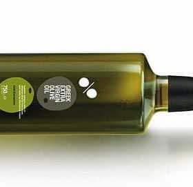 A green glass bottle of extra virgin olive oil with a label and a black cap. - Olive Oil Times