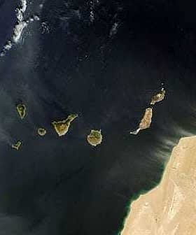 Aerial view of the Canary Islands showing multiple land masses surrounded by water. - Olive Oil Times