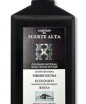 Black bottle of Cortijo De Suerte Alta extra virgin olive oil with a label and a dark background. - Olive Oil Times