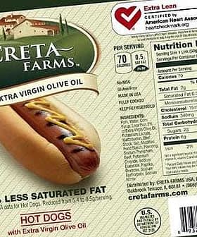 Package of Creta Farms hot dogs featuring extra virgin olive oil and nutrition facts. - Olive Oil Times