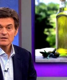Dr. Oz speaking with olive oil bottles displayed in the background during a television segment. - Olive Oil Times