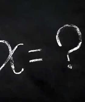 Chalkboard with the equation 'x = ?' written in white chalk. - Olive Oil Times