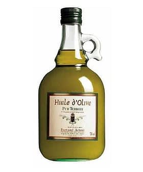 Glass bottle of Huile d'Olive Pur Terroir olive oil with a green liquid inside. - Olive Oil Times