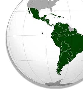 Map highlighting the countries of Latin America in green on a globe. - Olive Oil Times