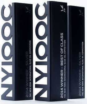 Three black award trophies for the New York International Olive Oil Competition with silver and best of class labels. - Olive Oil Times