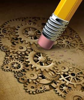Illustration of a pencil eraser removing gears from a brain, symbolizing thought processes. - Olive Oil Times