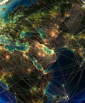 Digital representation of the Earth with illuminated connections across continents and oceans. - Olive Oil Times