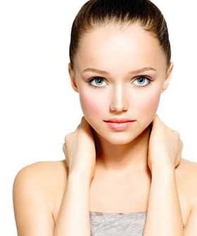 Young woman with long hair and natural makeup, looking directly at the camera. - Olive Oil Times