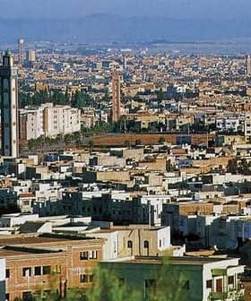 A panoramic view of Oujda, Morocco, featuring various buildings and structures in the landscape. - Olive Oil Times