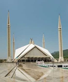 Faisal Mosque in Islamabad with four tall minarets and a large triangular roof structure. - Olive Oil Times