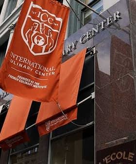 Exterior view of the International Culinary Center with banners displaying its name and founding details. - Olive Oil Times