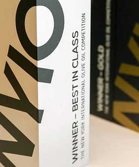 Packaging for the New York International Olive Oil Competition with 'Winner - Best in Class' text. - Olive Oil Times