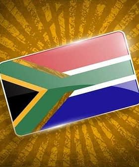 Graphic representation of the South African flag with a textured background. - Olive Oil Times