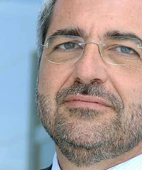 A man with glasses and a beard looking directly at the camera with a neutral expression. - Olive Oil Times