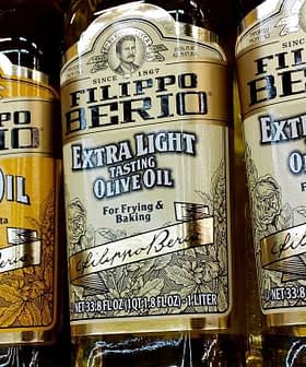 Various bottles of Filippo Berio olive oil, including extra light and extra virgin varieties. - Olive Oil Times