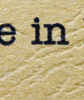 Text that reads 'Made in Italy' with green, white, and red colors representing the Italian flag. - Olive Oil Times