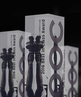 Three trophies for the 2016 Best in Class Award displayed in a row. - Olive Oil Times