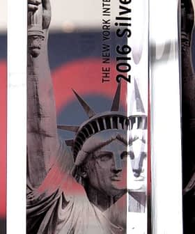 Three award trophies featuring the Statue of Liberty design for the 2016 New York International Olive Oil Competition. - Olive Oil Times