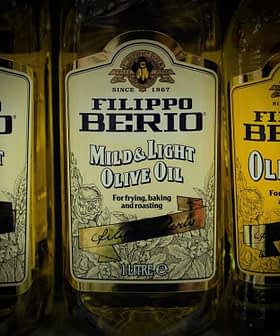 Row of Filippo Berio olive oil bottles, including Mild & Light and Olive Oil varieties. - Olive Oil Times
