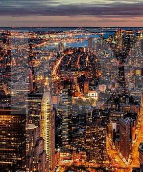 Aerial view of New York City skyline at night with illuminated buildings and streets. - Olive Oil Times