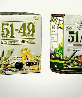 Two boxes of 51-49 extra virgin olive oil with distinct designs and labeling. - Olive Oil Times