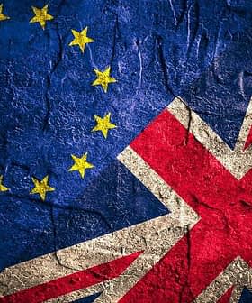Close-up of the European Union and United Kingdom flags displayed together with a textured background. - Olive Oil Times