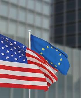 United States flag and European Union flag waving side by side on flagpoles. - Olive Oil Times