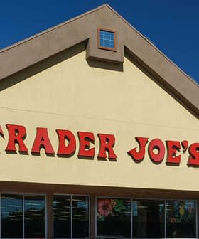 Exterior view of a Trader Joe's store with a prominent sign displaying the store name. - Olive Oil Times