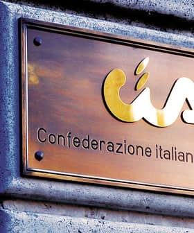Bronze plaque displaying the logo and name of Confederazione Italiana Agricoltori. - Olive Oil Times