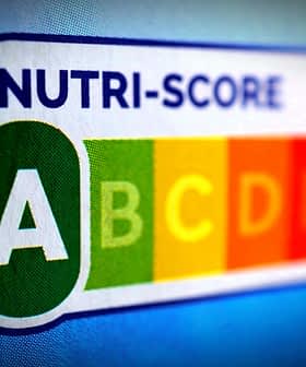 Nutri-Score label displaying grades A to E in a colorful format on a blue background. - Olive Oil Times