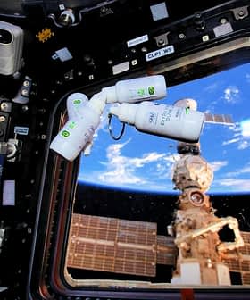 Inside the International Space Station showing a window view of Earth and space tools. - Olive Oil Times