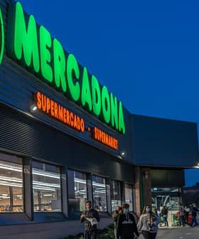 Exterior view of a Mercadona supermarket with illuminated signage during dusk. - Olive Oil Times
