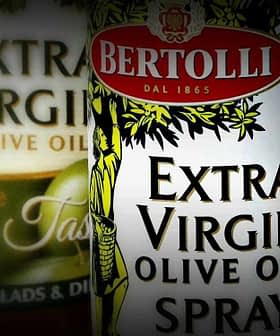 Три бутылки оливкового масла первого отжима Bertolli, включая вариант с распылителем и вариант с фруктовым вкусом. Olive Oil Times