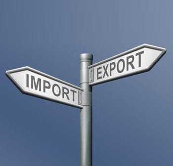 Directional signpost indicating 'Import' and 'Export' with arrows pointing in opposite directions. - Olive Oil Times