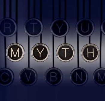 Gros plan des touches d'une machine à écrire avec les lettres M, Y, T, H mises en évidence sur un fond sombre. - Olive Oil Times