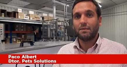 Paco Albert speaking in front of a production area at Pet Solutions. - Olive Oil Times