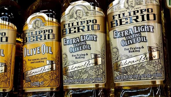 Various bottles of Filippo Berio olive oil, including extra light and extra virgin varieties. - Olive Oil Times