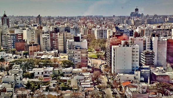 Aerial view of a densely populated urban area in Buenos Aires with various buildings and structures. - Olive Oil Times