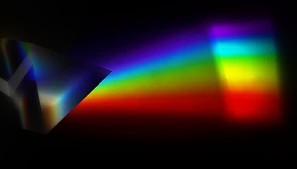 Light spectrum displayed through a prism, showing a range of colors from red to violet. - Olive Oil Times