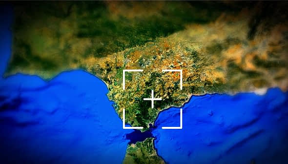 Aerial image showing a coastal region with land and water features in view. - Olive Oil Times