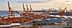 Port à conteneurs du Pirée, à Athènes, avec des grues et des conteneurs maritimes le long du front de mer. - Olive Oil Times